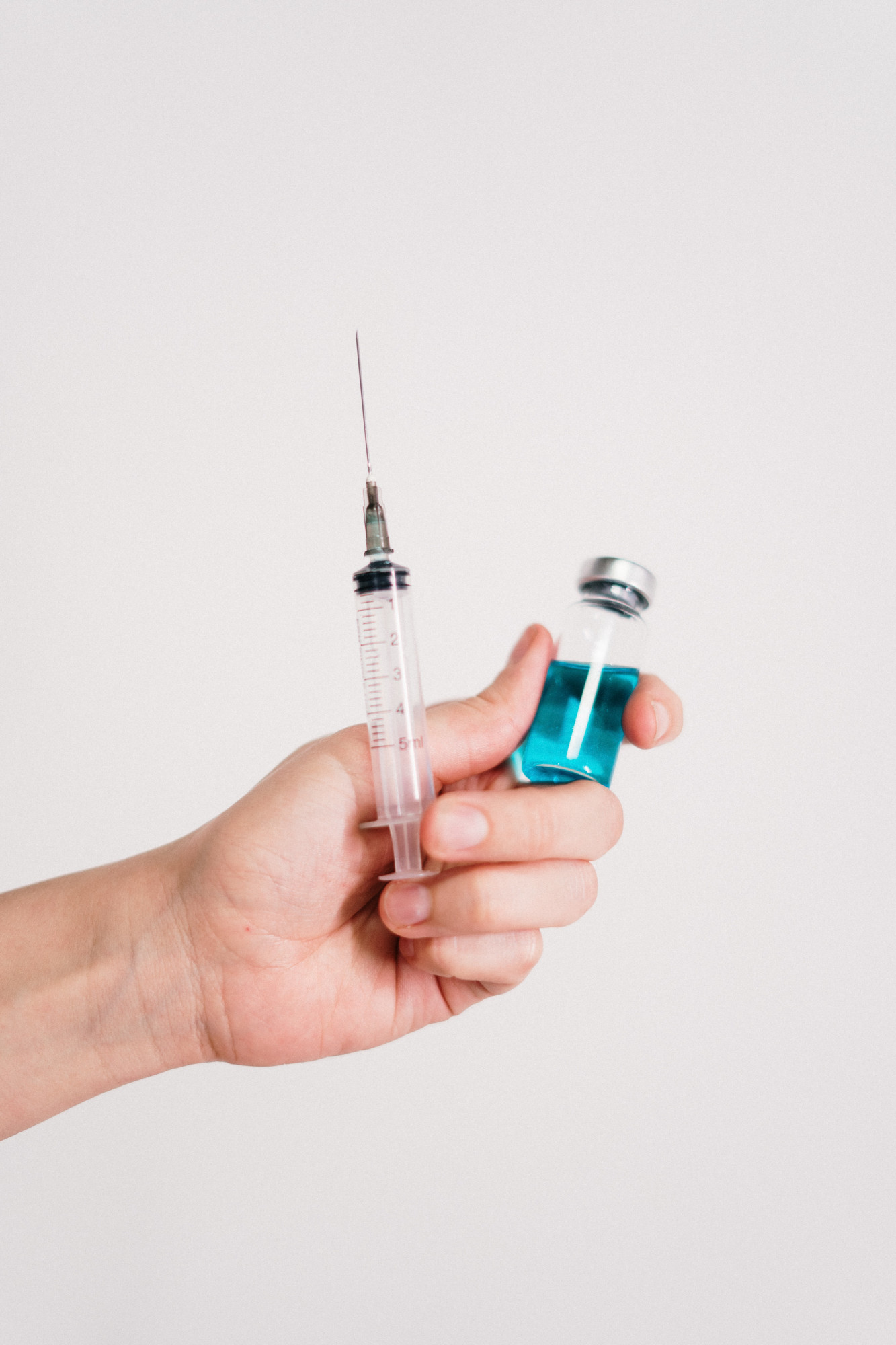Impfstoff und Spritze